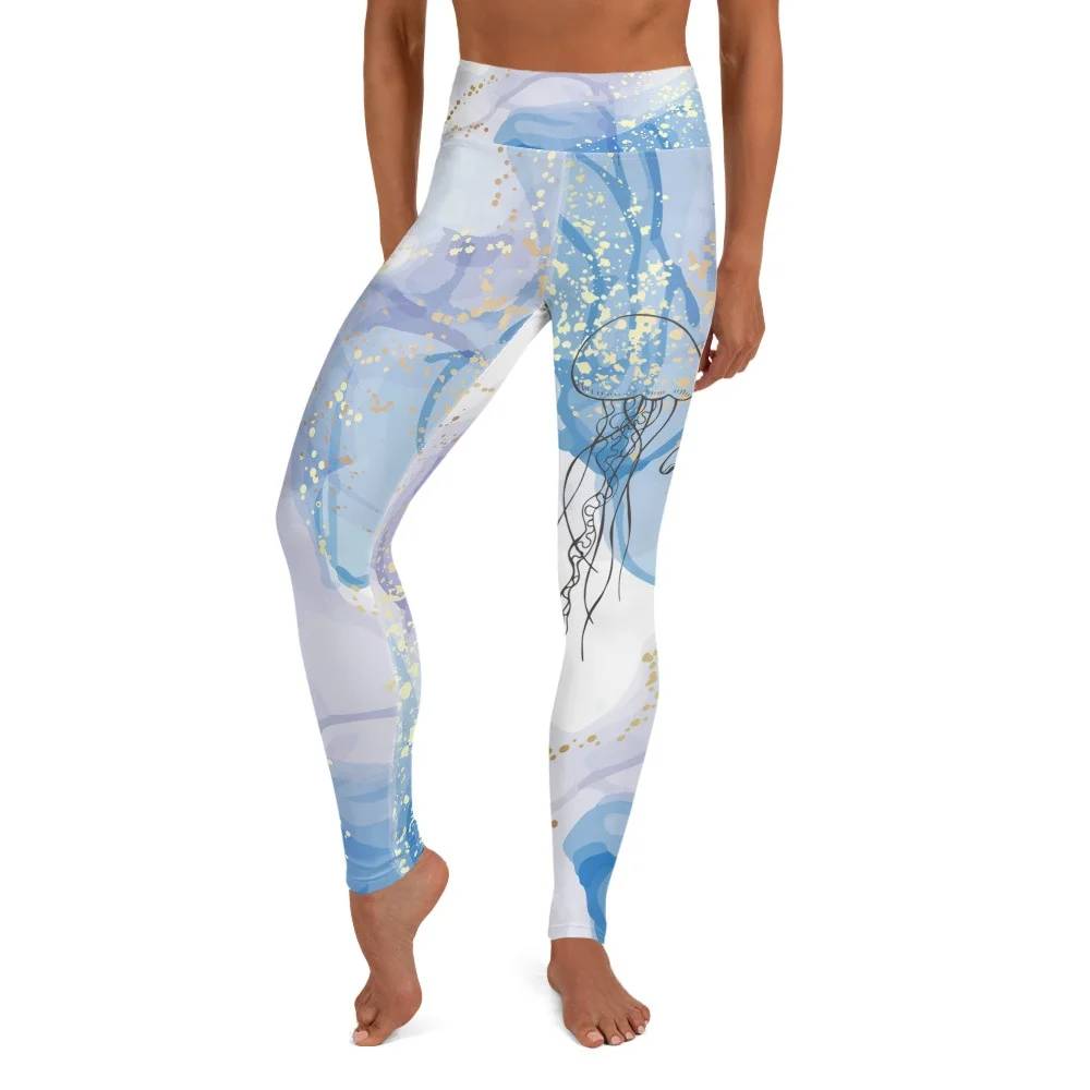 Woman wearing long, high waisted scuba diving leggings with a jellyfish print